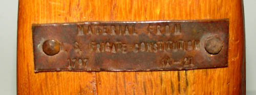 Metal plate mounted to wood